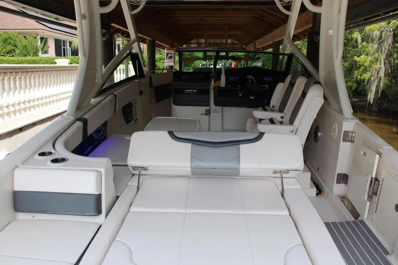  Yacht Photos Pics 2021 Chaparral 280 OSX boat interior with luxurious seating and modern design.