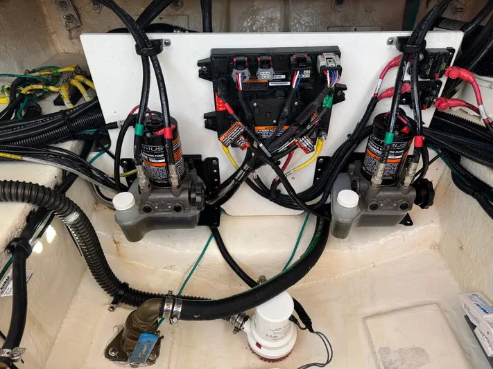  Yacht Photos Pics Engine compartment of 2021 Chaparral 280 OSX with wiring and hydraulic systems.