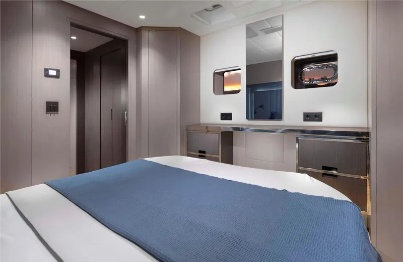 Elif Yacht Photos Pics Luxurious bedroom interior of 2022 Soyaslan CAT63 yacht with modern design and elegant furnishings.