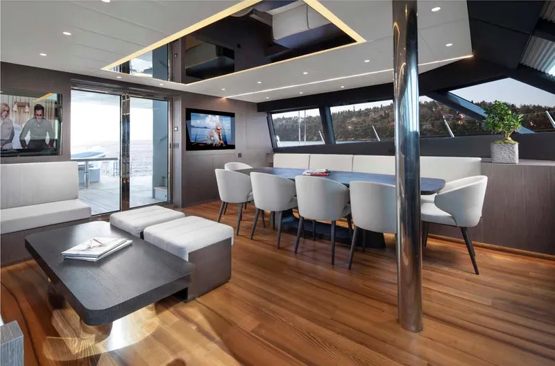 Elif Yacht Photos Pics Luxurious interior of 2022 Soyaslan CAT63 yacht with modern dining area and sleek design.
