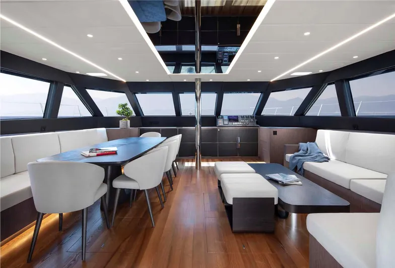 Elif Yacht Photos Pics Luxurious interior of 2022 Soyaslan CAT63 yacht with modern seating and elegant design.