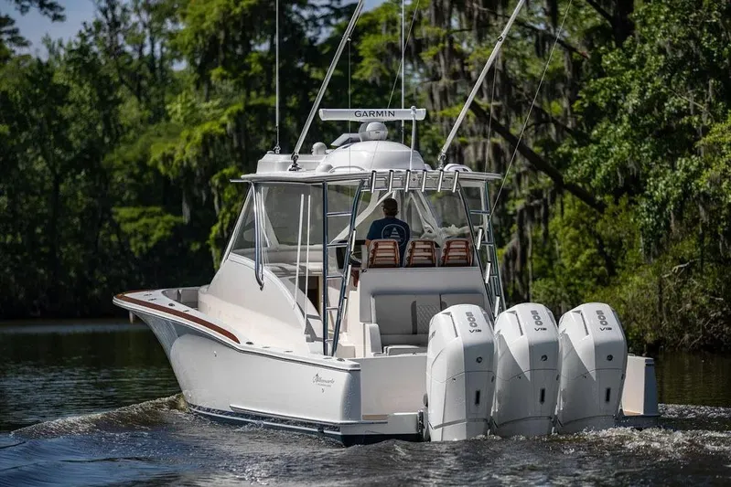 Kingston Grey Yacht Photos Pics Manufacturer Provided Image: 2026 Albemarle 41 Carolinian Fisharound Express cruising on a scenic river.