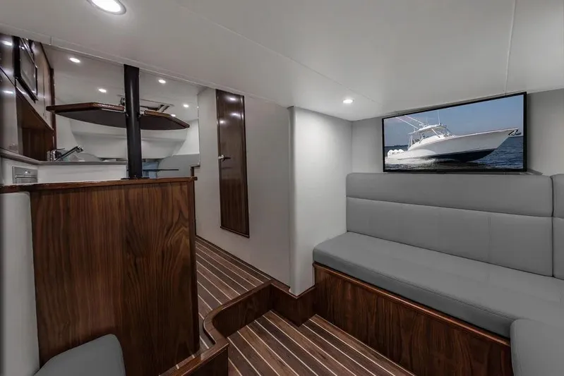 Kingston Grey Yacht Photos Pics Manufacturer Provided Image: Luxurious interior of 2026 Albemarle 41 Carolinian Fisharound Express with sleek wood finishes.