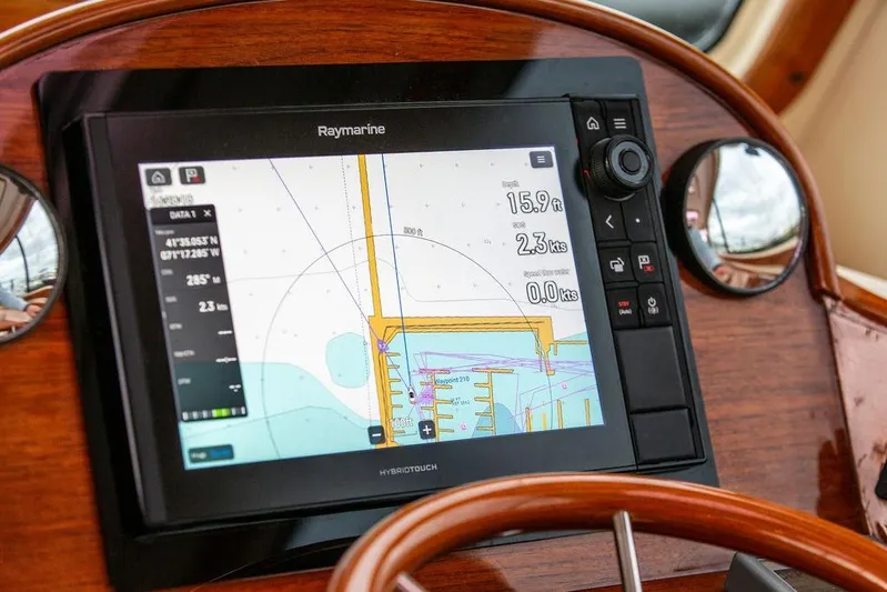 Zuzu Yacht Photos Pics Navigation system on 2004 Hinckley Picnic Boat EP displaying nautical chart.