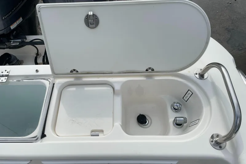 Intensity 2 Yacht Photos Pics Open storage compartment on a 2015 Century 2901 Center Console boat.