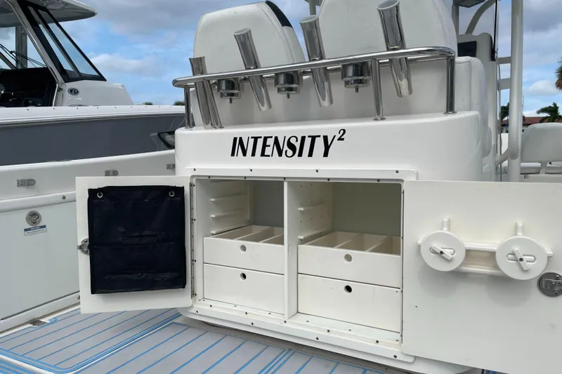Intensity 2 Yacht Photos Pics 2015 Century 2901 Center Console boat with open storage compartments labeled "Intensity²".