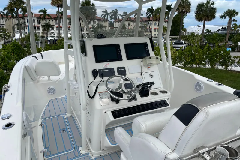 Intensity 2 Yacht Photos Pics 2015 Century 2901 Center Console boat with modern dashboard and dual screens.