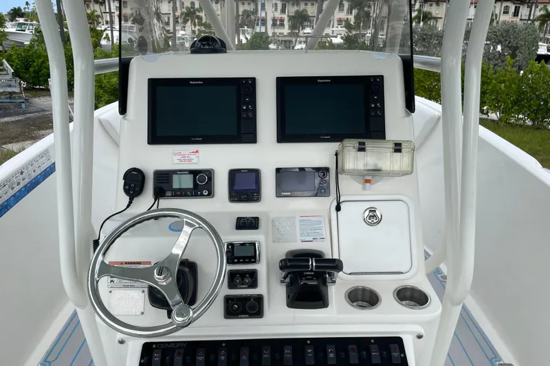 Intensity 2 Yacht Photos Pics 2015 Century 2901 Center Console boat dashboard with navigation screens and controls.