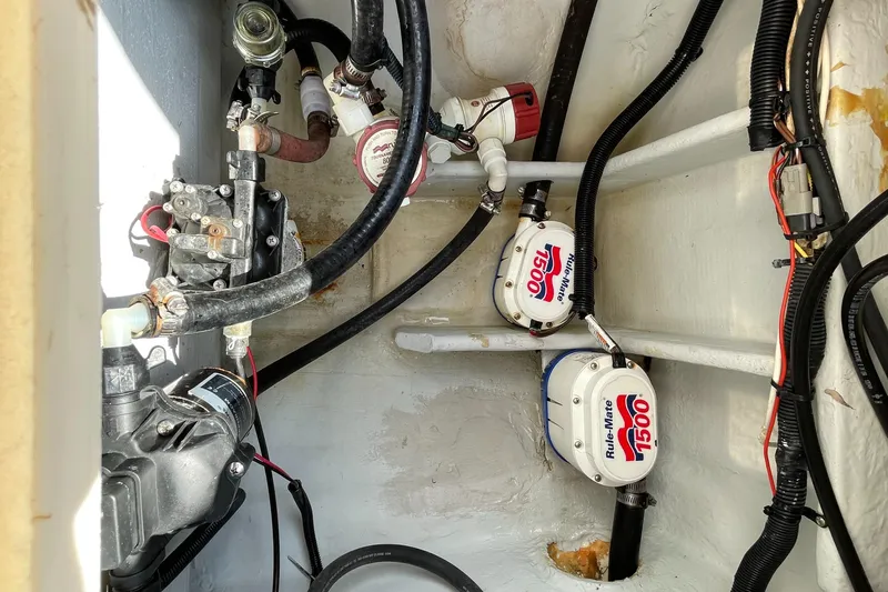 Intensity 2 Yacht Photos Pics 2015 Century 2901 Center Console bilge area with pumps and wiring.