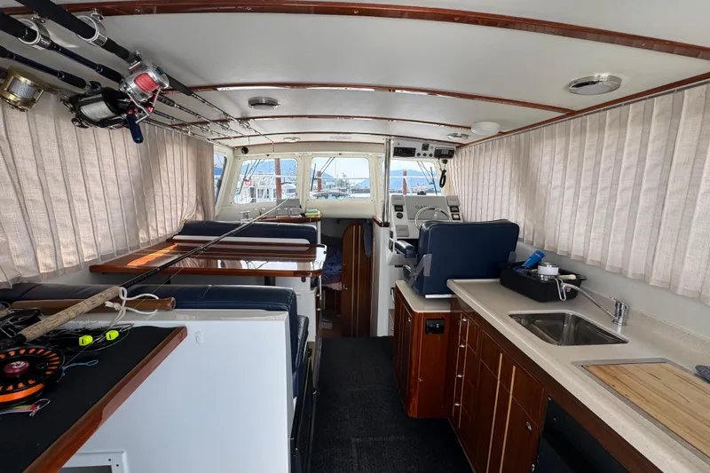  Yacht Photos Pics Interior of 2017 Ocean Sport Roamer boat with fishing gear and kitchenette.
