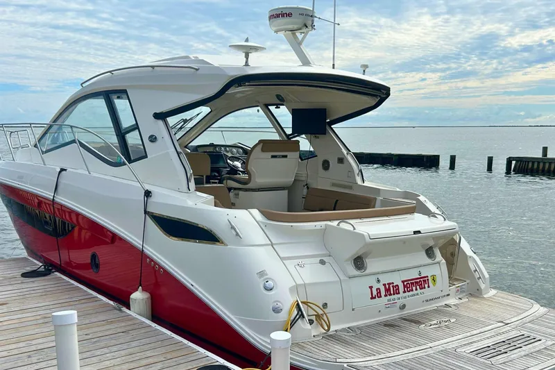  Yacht Photos Pics 2017 Sea Ray Sundancer 350 Coupe docked, featuring sleek design and spacious interior.