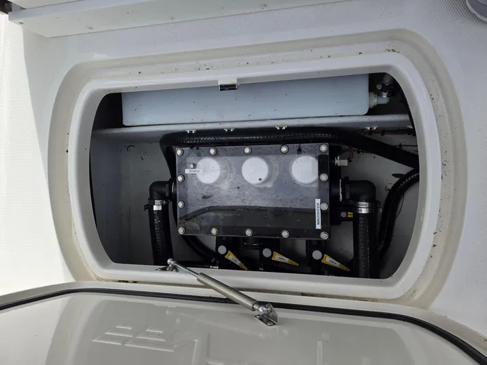 Seavee Yacht Photos Pics 2023 SeaVee 270Z boat compartment showcasing internal components and wiring.