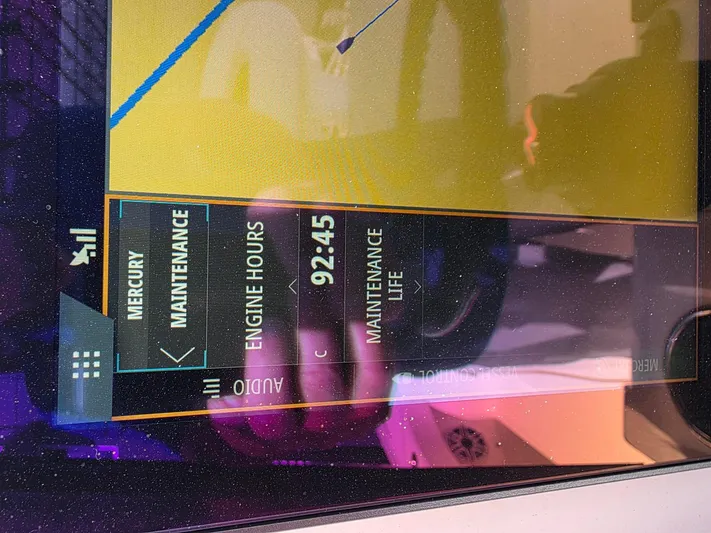 Seavee Yacht Photos Pics Display screen showing Mercury maintenance details on a 2023 SeaVee 270Z boat.