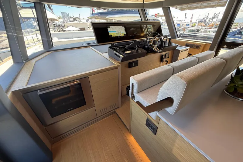  Yacht Photos Pics Interior of 2026 Pardo Yachts GT75, featuring modern helm and seating area.