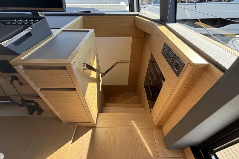  Yacht Photos Pics Interior of 2026 Pardo Yachts GT75, featuring sleek wooden stairs and modern design elements.
