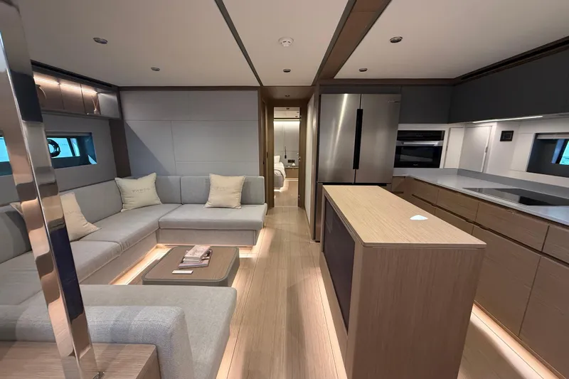  Yacht Photos Pics Luxurious interior of 2026 Pardo Yachts GT75 featuring modern kitchen and cozy seating area.