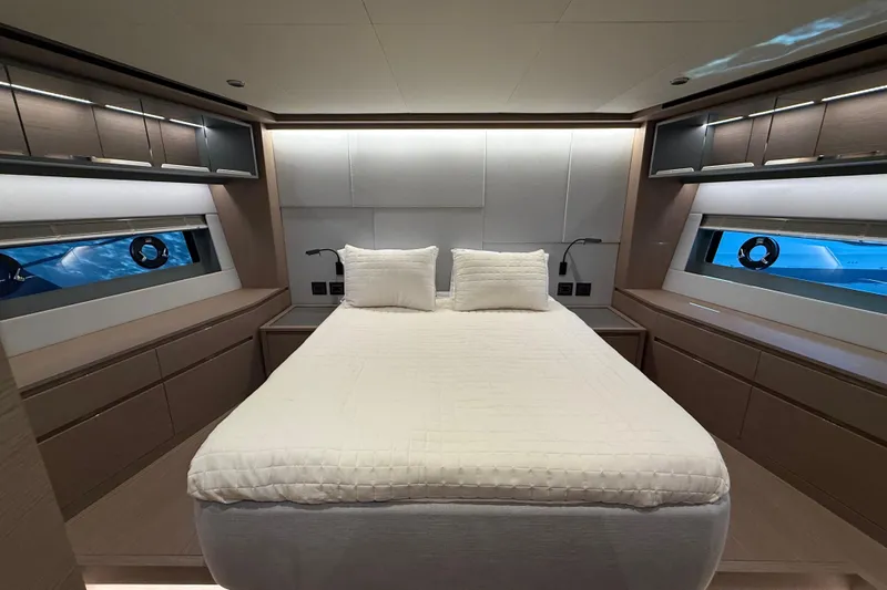  Yacht Photos Pics Luxurious bedroom interior of 2026 Pardo Yachts GT75 with modern design and elegant furnishings.