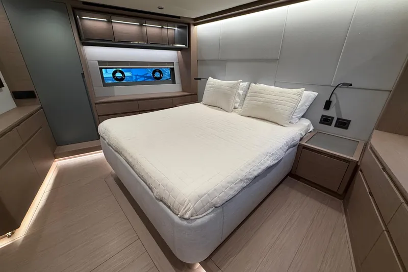  Yacht Photos Pics Luxurious bedroom interior of 2026 Pardo Yachts GT75, featuring modern design and elegant furnishings.