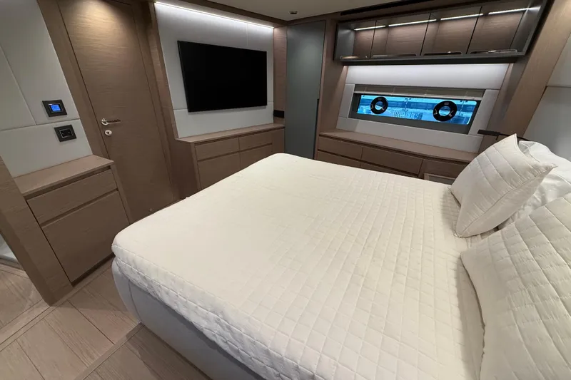  Yacht Photos Pics Luxurious bedroom interior of 2026 Pardo Yachts GT75 with modern design and elegant furnishings.