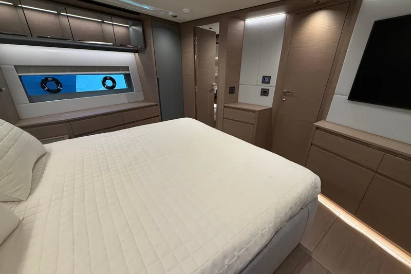  Yacht Photos Pics Luxurious interior of 2026 Pardo Yachts GT75, featuring elegant bedroom design.