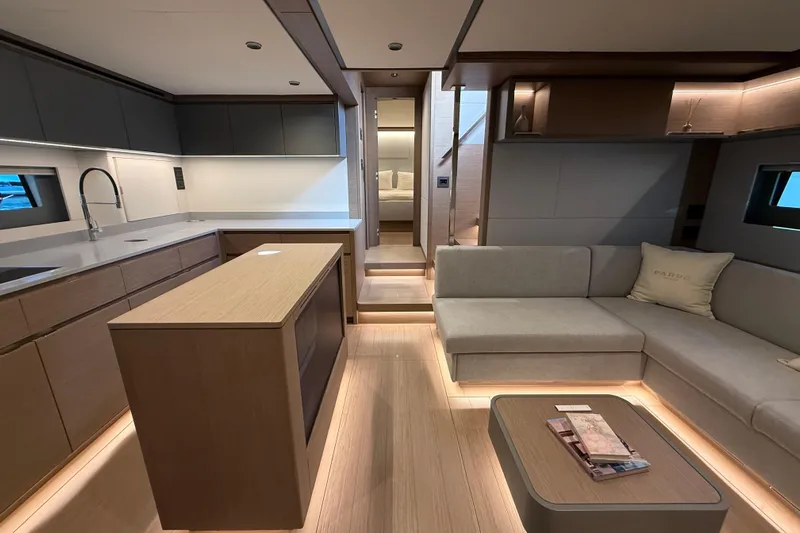  Yacht Photos Pics Luxurious interior of 2026 Pardo Yachts GT75, featuring modern kitchen and cozy seating area.