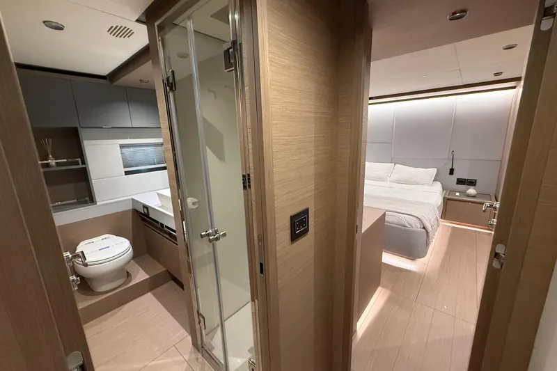 Yacht Photos Pics Luxurious interior of 2026 Pardo Yachts GT75 featuring bedroom and bathroom.