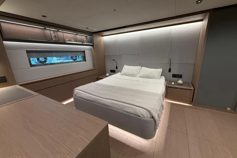  Yacht Photos Pics Luxurious bedroom interior of 2026 Pardo Yachts GT75 with modern design and ambient lighting.