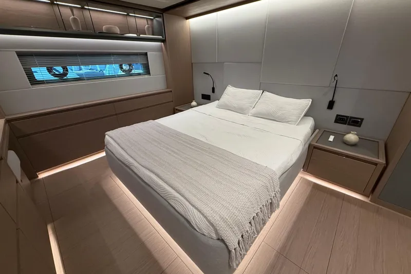  Yacht Photos Pics Luxurious bedroom interior of 2026 Pardo Yachts GT75, featuring modern design and elegant furnishings.