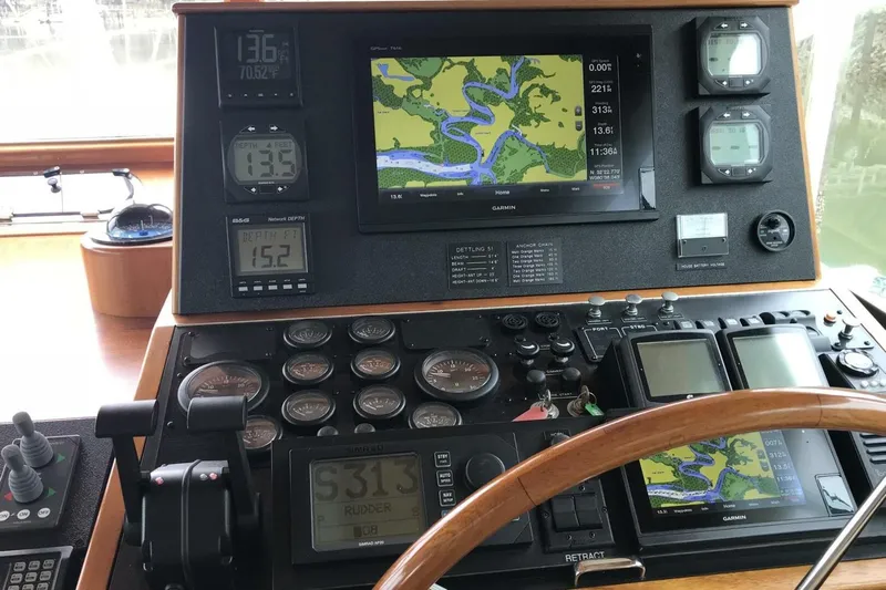 Just Right Yacht Photos Pics 2004 Dettling Express Cruiser dashboard with navigation and control instruments.