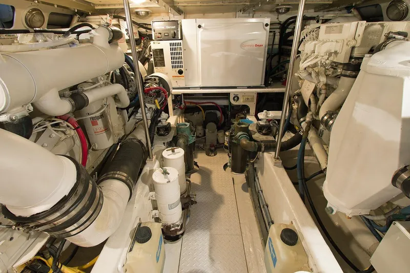 Just Right Yacht Photos Pics Engine room of a 2004 Dettling Express Cruiser with Cummins Onan generator.