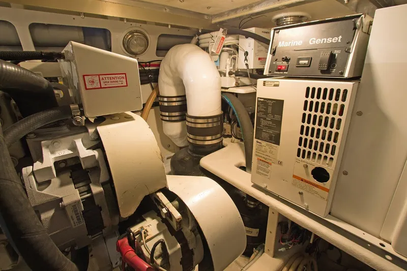 Just Right Yacht Photos Pics Engine room of 2004 Dettling Express Cruiser with marine generator and equipment.