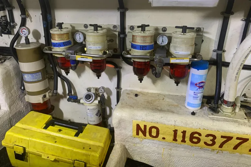 Lazy Days Yacht Photos Pics Engine room of 2005 Great Harbour GH37 with fuel filters and maintenance tools.