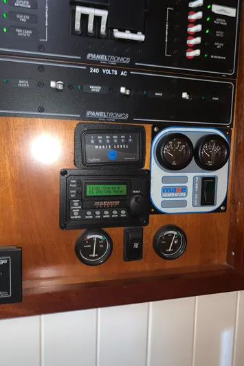 Lazy Days Yacht Photos Pics Control panel of a 2005 Great Harbour GH37 boat with various gauges and switches.