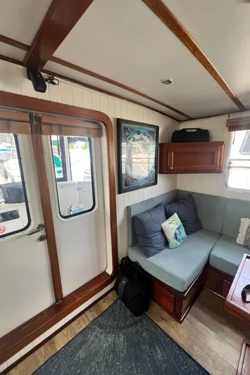 Lazy Days Yacht Photos Pics Interior of 2005 Great Harbour GH37 boat with cozy seating and wooden accents.