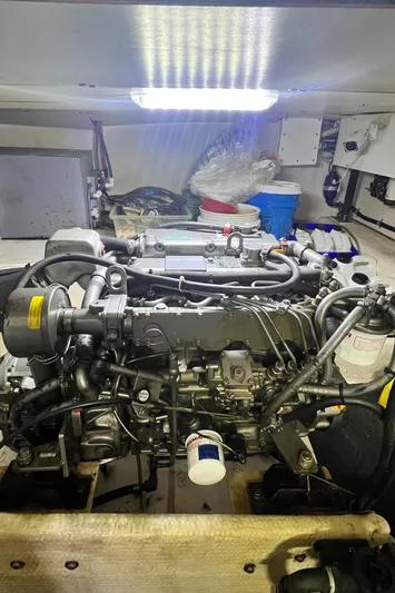 Lazy Days Yacht Photos Pics Engine room of a 2005 Great Harbour GH37 boat, featuring a well-maintained engine.