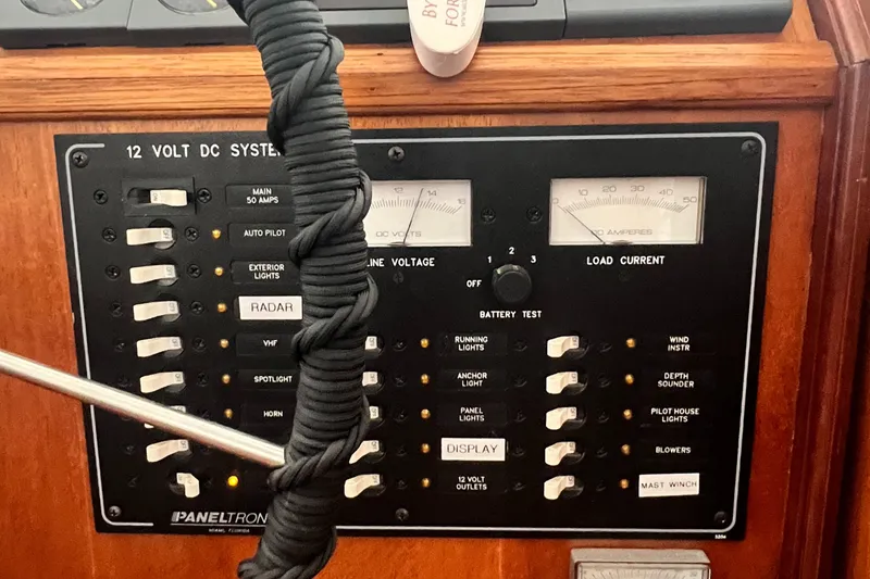 Lazy Days Yacht Photos Pics Control panel of a 2005 Great Harbour GH37 boat, featuring switches and gauges.