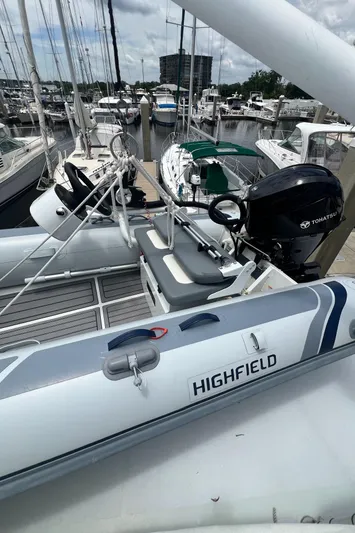 Lazy Days Yacht Photos Pics 2005 Great Harbour GH37 yacht docked with Highfield tender and outboard motor.