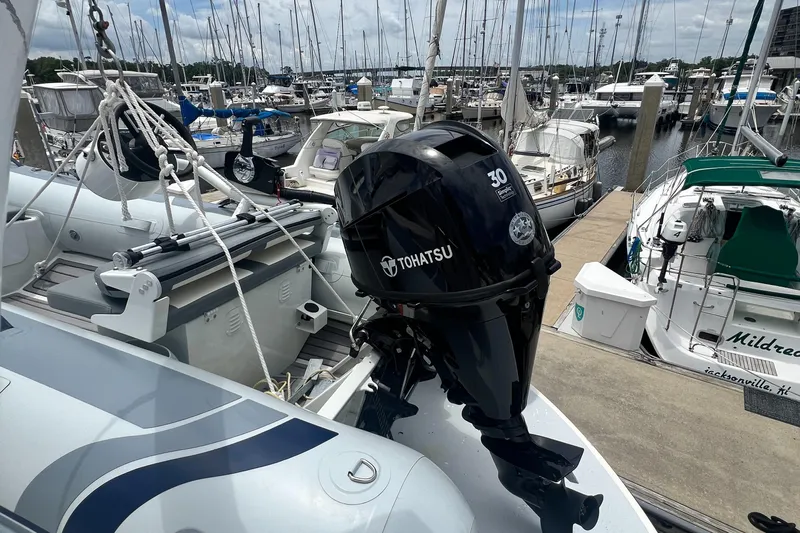 Lazy Days Yacht Photos Pics 2005 Great Harbour GH37 with Tohatsu outboard motor docked at marina.