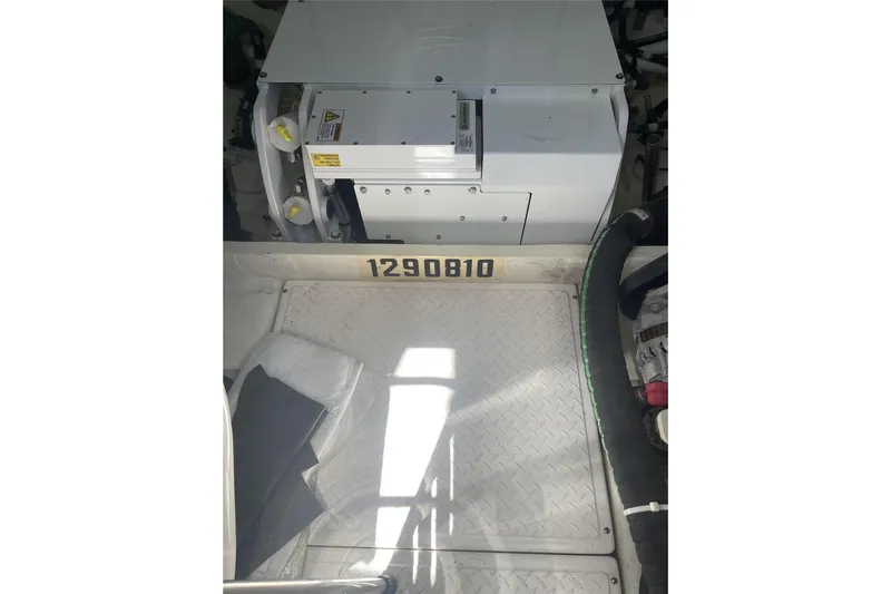 Mi Dia Yacht Photos Pics Engine room of 2019 Tiara Yachts F53 Flybridge with equipment and serial number.