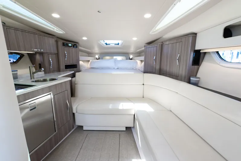 "plymouth Breeze" Yacht Photos Pics Luxurious interior of 2020 Regal 35 Sport Coupe with modern amenities and elegant design.