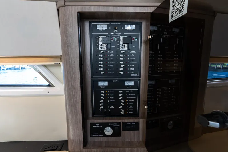 "plymouth Breeze" Yacht Photos Pics Electrical panel inside 2020 Regal 35 Sport Coupe boat cabin.