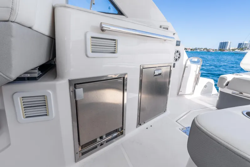 "plymouth Breeze" Yacht Photos Pics 2020 Regal 35 Sport Coupe yacht interior with stainless steel appliances and ocean view.