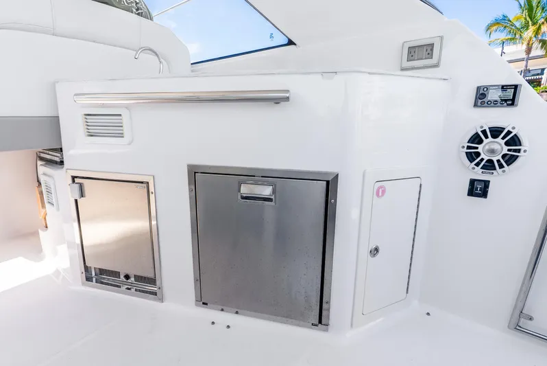 "plymouth Breeze" Yacht Photos Pics 2020 Regal 35 Sport Coupe yacht interior with stainless steel appliances and modern design.