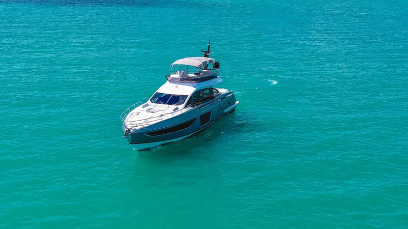 Salina Yacht Photos Pics 2024 Azimut S7 yacht cruising on turquoise waters.
