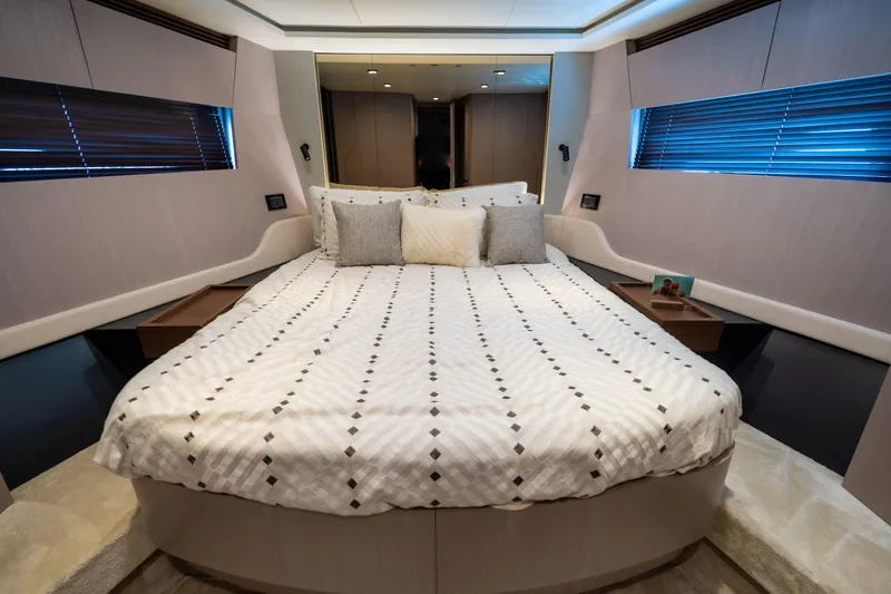 Salina Yacht Photos Pics Luxurious bedroom interior of 2024 Azimut S7 yacht with elegant bedding and modern design.