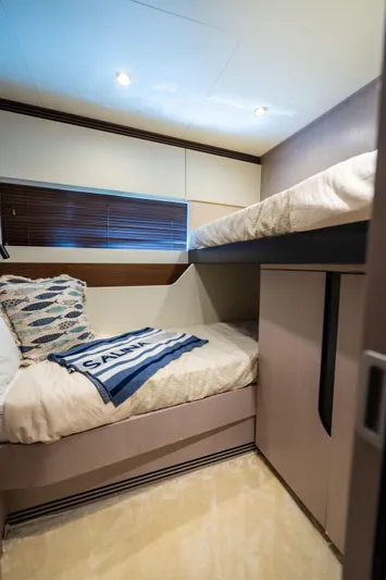 Salina Yacht Photos Pics 2024 Azimut S7 yacht cabin with bunk beds and modern decor.