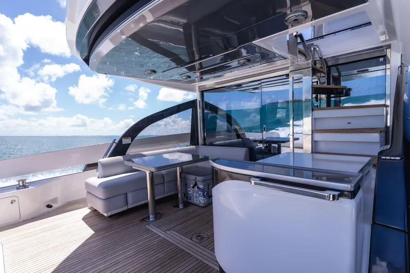 Salina Yacht Photos Pics Luxurious 2024 Azimut S7 yacht deck with modern seating and ocean view.