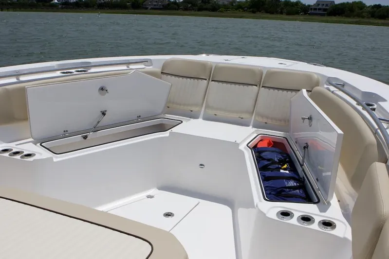  Yacht Photos Pics Manufacturer Provided Image: 2018 Sea Fox 328 Commander boat interior with open storage compartments and seating.