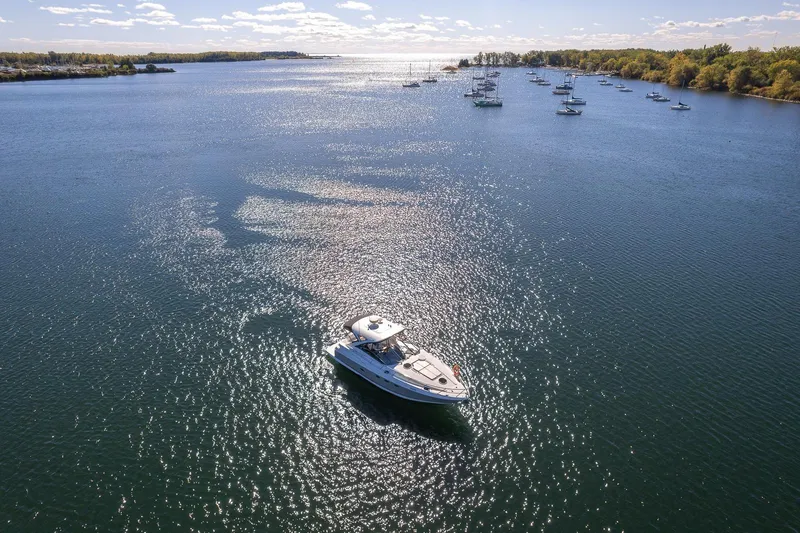  Yacht Photos Pics Aerial view of 2009 Regal Commodore 4060 yacht on a sunny lake.