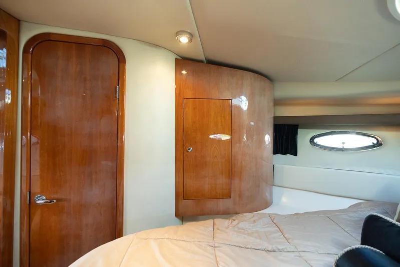  Yacht Photos Pics Luxurious cabin interior of 2009 Regal Commodore 4060 yacht with wood finish.